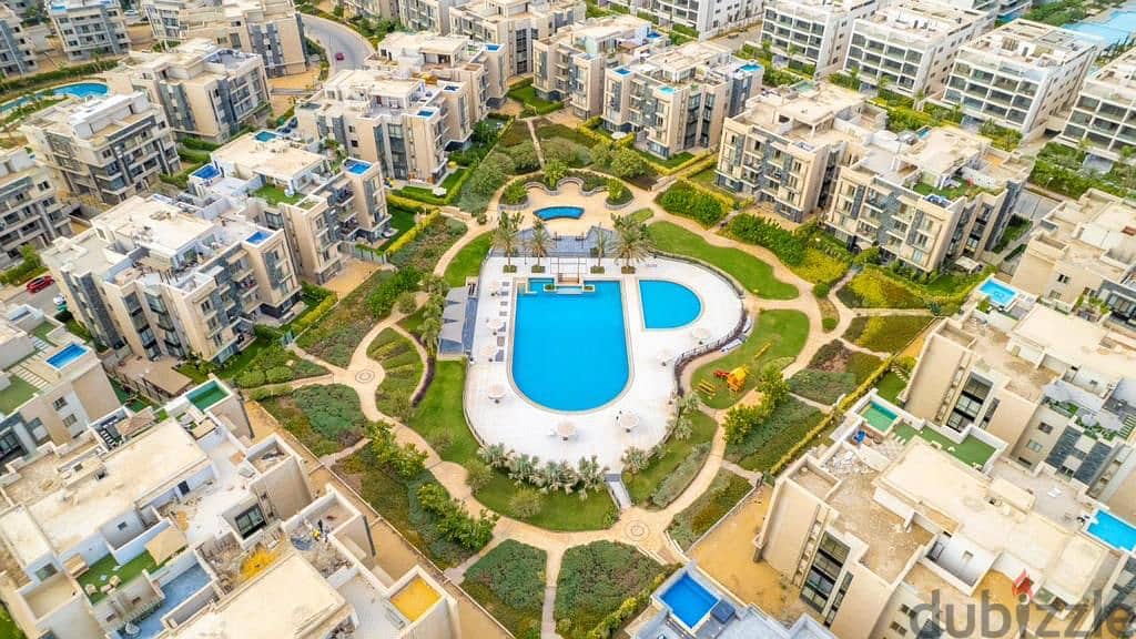 Own a penthouse with a roof area of ​​100 meters in the heart of Fifth Settlement ready to move With 10% down payment _ Prime Location  | Galleria | 4