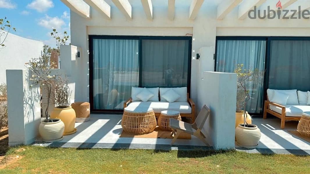 Two-room chalet for sale in DBay North Coast with a 10% discount in installments over 10 years, first row on Crystal Lagoon DBay North Coast 7