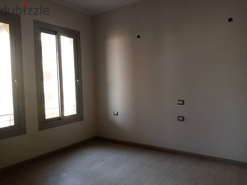 apartment 149m semi furnished for rent in village gate New Cairo 4