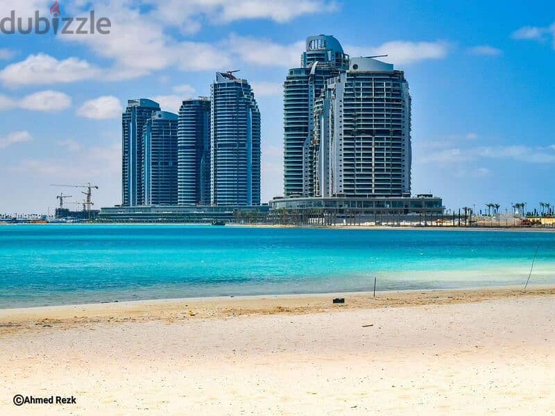 With only 5% down payment, own your apartment in New Alamein Towers, with a view on the sea Latin District | Ready To Move , fully finished 2