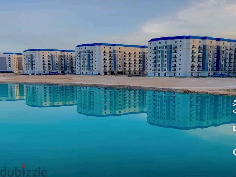 With only 5% down payment, own your apartment in New Alamein Towers, with a view on the sea Latin District | Ready To Move , fully finished 2