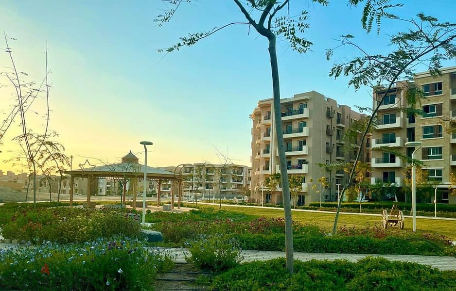 Luxurious Apartment for sale, 137 sqm + Private Garden with a very distinctive landscape view in front of Cairo International Airport, available on in 2