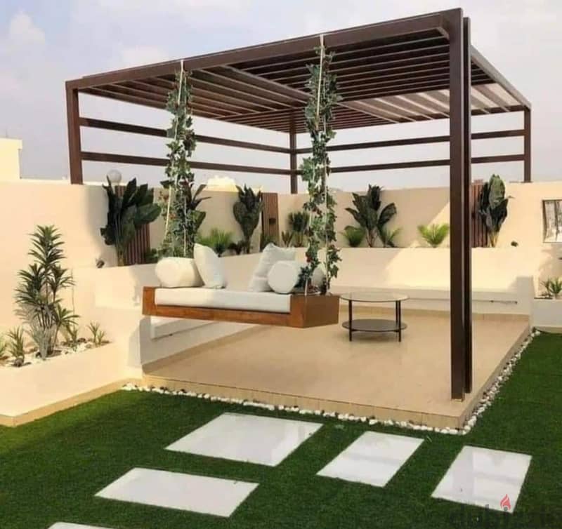 Luxurious Apartment for sale, 137 sqm + Private Garden with a very distinctive landscape view in front of Cairo International Airport, available on in 9