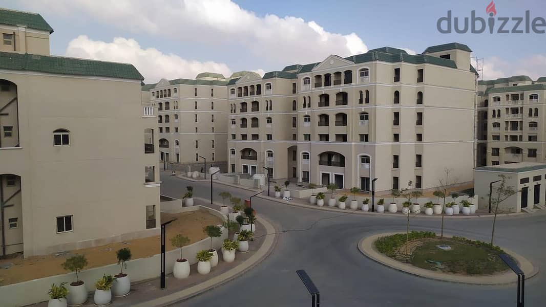 Apartment for sale with a private garden182m ready to move, in L'Avenir Compound, Al Ahly Sabbour, below market price. 1