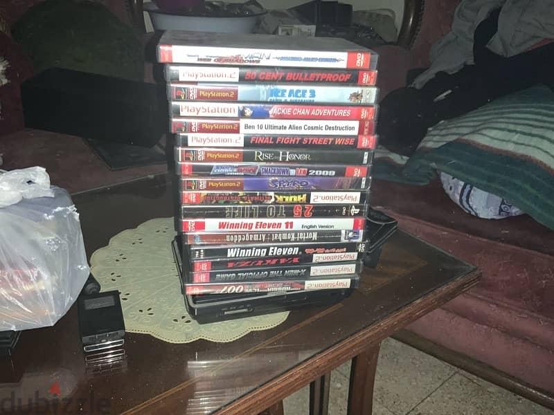playstation 2 accessories and 137 game discs 5