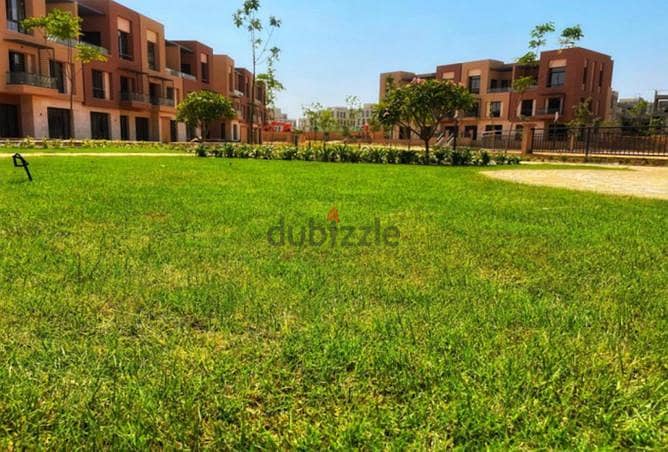 town house middle 258 m for sale with installments till 2025 in District 5 Marakez ( Al Hokeir) 1