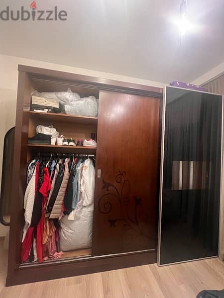 Selling this wardrobe with its 2 commodes from Mazloum Home. 4