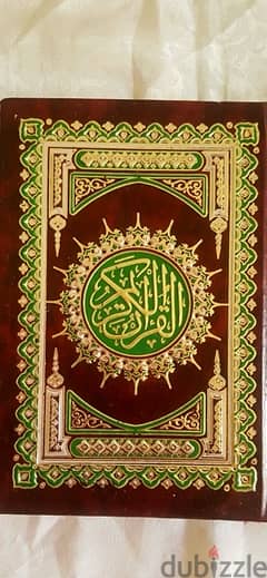 كتاب ‏القرآن الكريم داخل تابلوة خشب