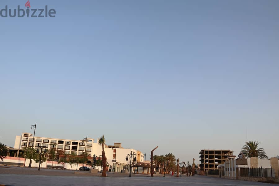Own your apartment in a quiet location in Hurghada, overlooking the Tourist walk , with high investment 4