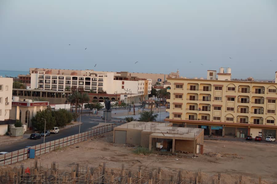 Own your apartment in a quiet location in Hurghada, overlooking the Tourist walk , with high investment 14
