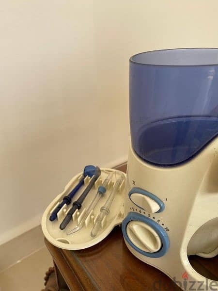 ماكينة تنظيف الاسنان بالماء 3
