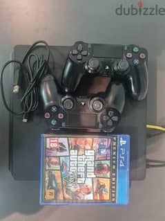 playstation 4 slim 500gb with 2 original controllers and 2 games