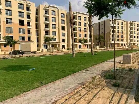 For sale, two-room apartment, 110 square meters, 8 years installments, in Sarai Compound, in front of Madinaty 4
