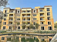 An apartment with a private garden for sale in Sarai Compound at a special price, minutes away from the Fifth Settlement, and there is also a 42% disc 0