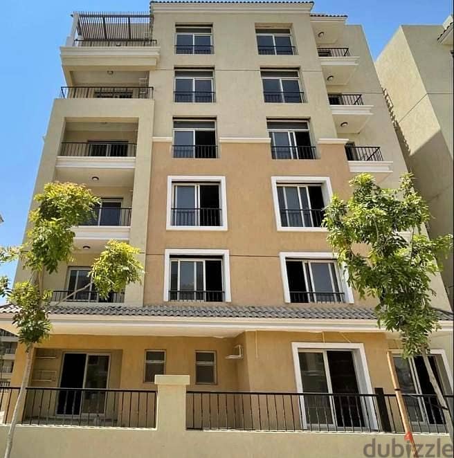 An apartment with a private garden for sale in Sarai Compound at a special price, minutes away from the Fifth Settlement, and there is also a 42% disc 1
