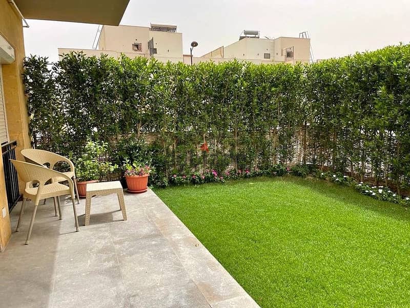 An apartment with a private garden for sale in Sarai Compound at a special price, minutes away from the Fifth Settlement, and there is also a 42% disc 2