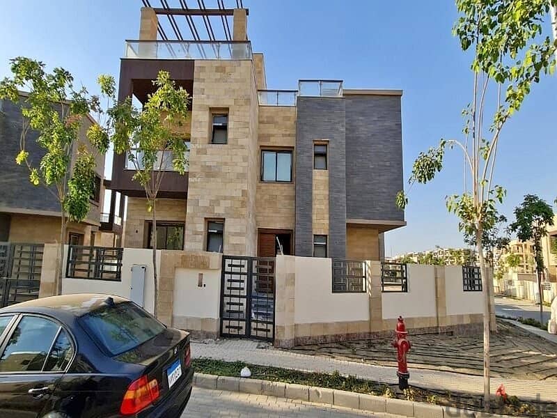 Townhouse corner for sale in an all-villa compound in the heart of Taj City Compound, area of ​​158 square meters + private garden, directly in front 2