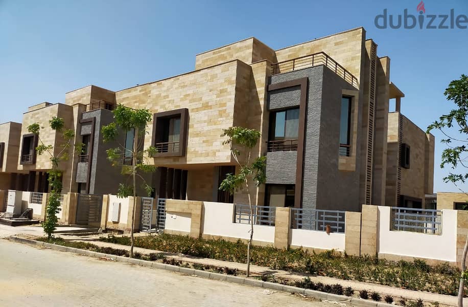 Townhouse corner for sale in an all-villa compound in the heart of Taj City Compound, area of ​​158 square meters + private garden, directly in front 4