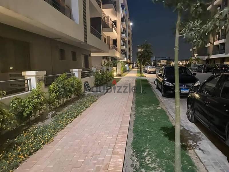 Townhouse corner for sale in an all-villa compound in the heart of Taj City Compound, area of ​​158 square meters + private garden, directly in front 8