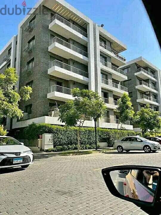 With a 42% cash discount, Apartment for sale in a distinctive location directly in front of Cairo Airport in Taj City Compound (ask a 7