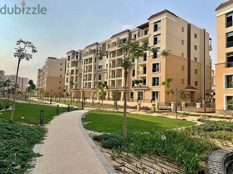 Apartment for sale, 147 sqm + garden, 122 sqm, open view in sarai new cairo 1