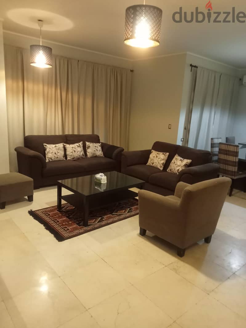 lowest price Furnished Apartment with garden for rent in Village Gate new cairo 10