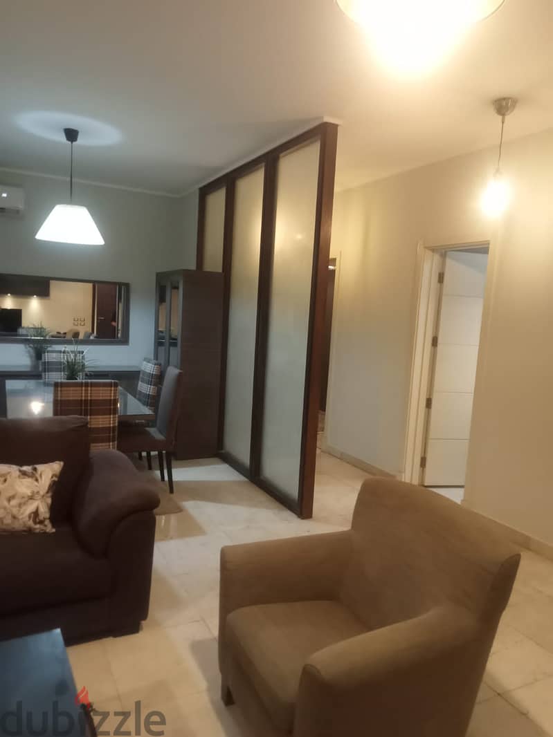 lowest price Furnished Apartment with garden for rent in Village Gate new cairo 11