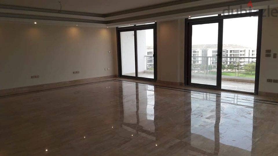 Luxurious Apartment for sale, 167 sqm + Private Garden with a very distinctive landscape view in front of Cairo International Airport, available on in 1