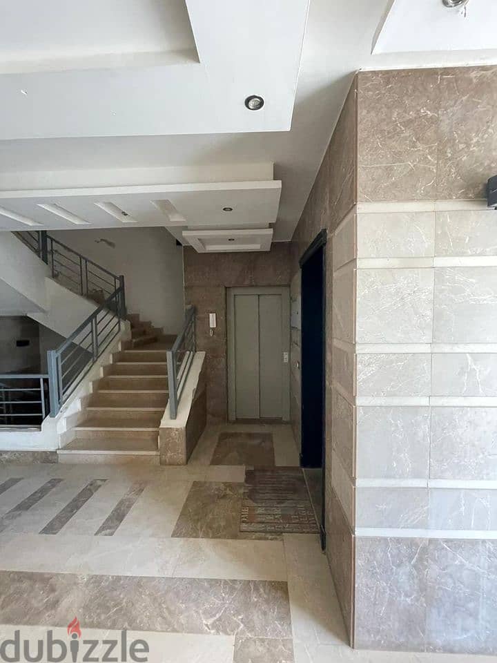 Luxurious Apartment for sale, 167 sqm + Private Garden with a very distinctive landscape view in front of Cairo International Airport, available on in 8