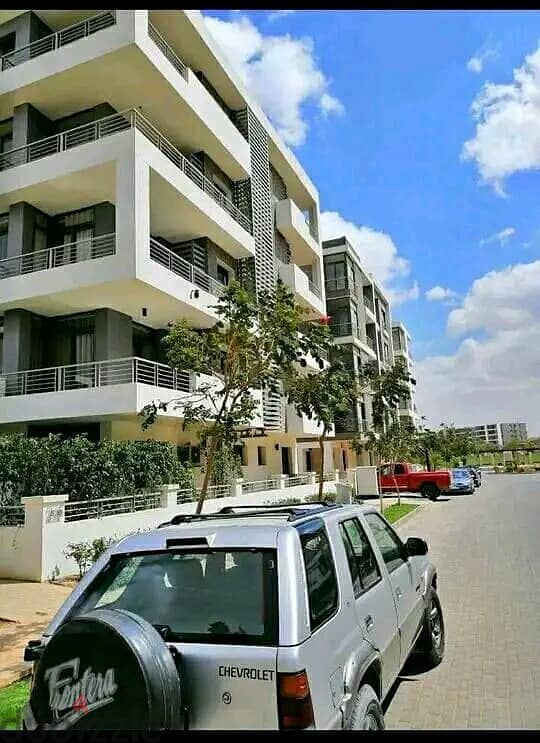 Luxurious Apartment for sale, 164 sqm + Private Garden with a very distinctive landscape view in front of Cairo International Airport, available on in 4