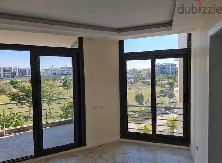 Luxurious Apartment for sale, 164 sqm + Private Garden with a very distinctive landscape view in front of Cairo International Airport, available on in 7