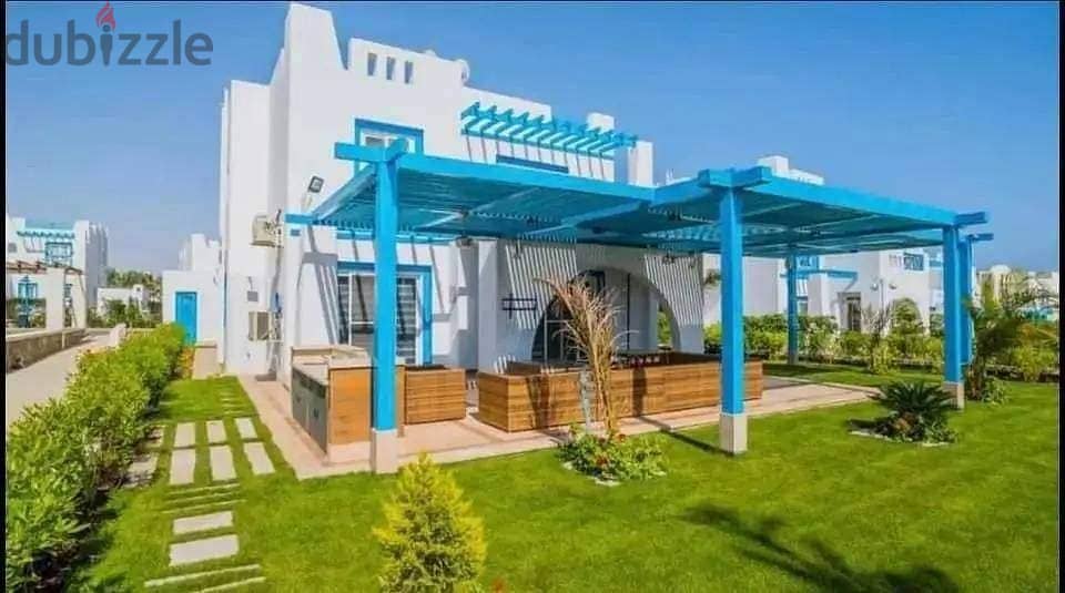 Villa for sale, 3 floors on the sea, finished, with installments over 8 years, in Mountain View Sidi Abdel Rahman, next to Marassi 4