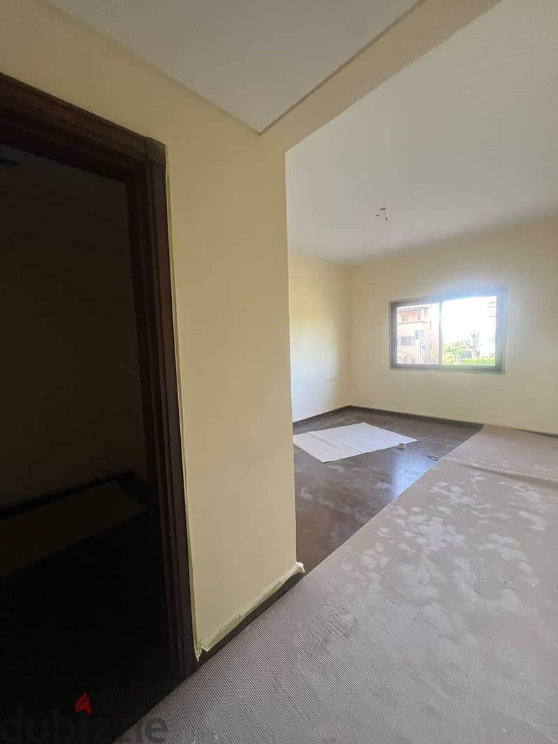 for rent villa 5 bed Semi furnished + Kitchen +Acs in mivida new cairo 2