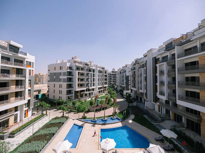 Apartment for sale in Fifth Settlement, Golden Square Icon Compound with only 15% down payment A distinctive view of the landscape - Cash dis 30% 7