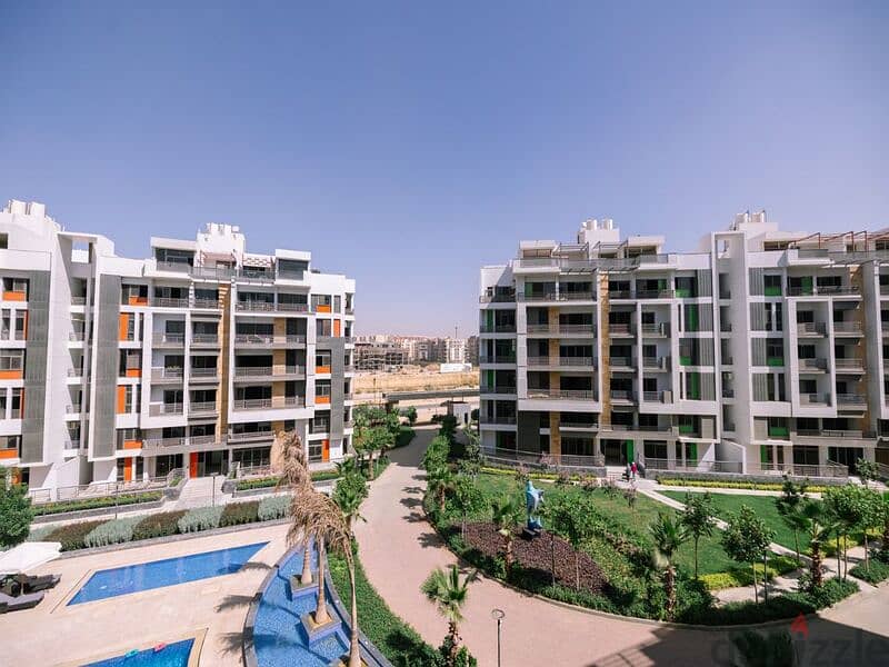 Apartment for sale in Fifth Settlement, Golden Square Icon Compound with only 15% down payment A distinctive view of the landscape - Cash dis 30% 21