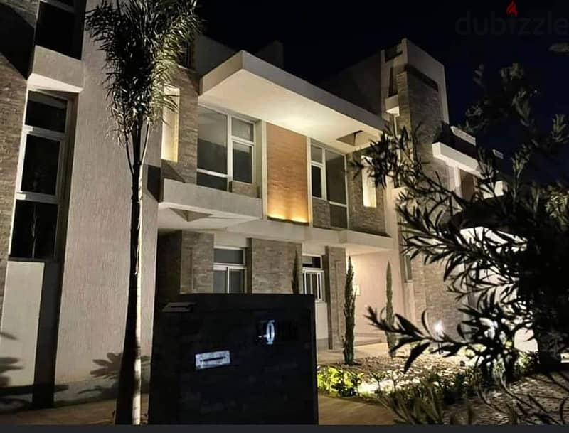 - Townhouse corner for sale in an all-villa compound in the heart of Taj City Compound, area of ​​158 square meters + private garden, directly in fron 1