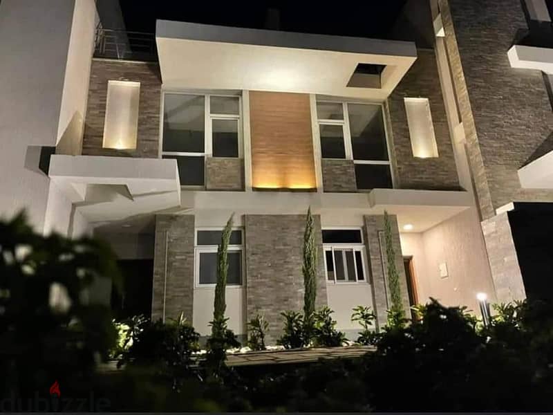 - Townhouse corner for sale in an all-villa compound in the heart of Taj City Compound, area of ​​158 square meters + private garden, directly in fron 2