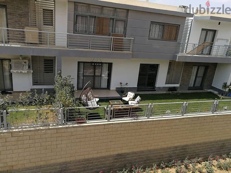 - Townhouse corner for sale in an all-villa compound in the heart of Taj City Compound, area of ​​158 square meters + private garden, directly in fron 13