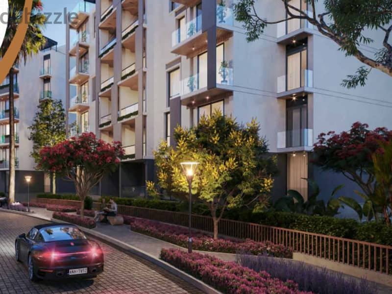 Apartment with garden for sale in Fifth Settlement, Golden Square, in icon Compound, with only 15% down payment 30% cash DIS | view of the landscape 5