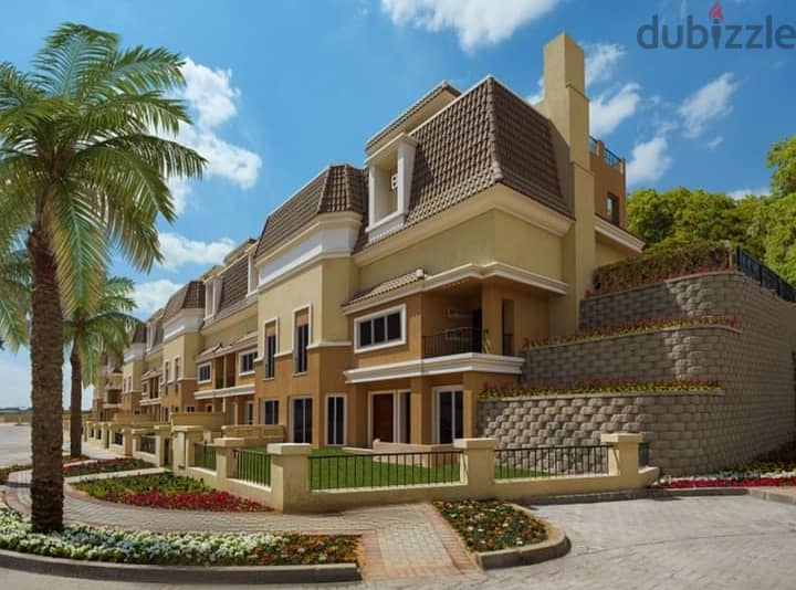 S villa for sale in Sarai Compound, New Cairo, corner 239 m, on the Suez Road directly next to Madinaty and Mountain View, 120% discount installments 12