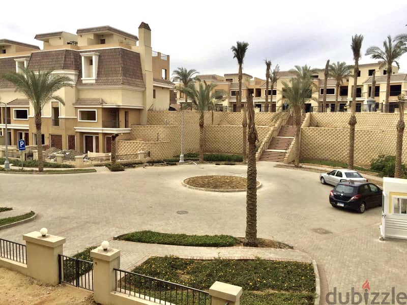 S villa for sale in Sarai Compound, New Cairo, corner 239 m, on the Suez Road directly next to Madinaty and Mountain View, 120% discount installments 15