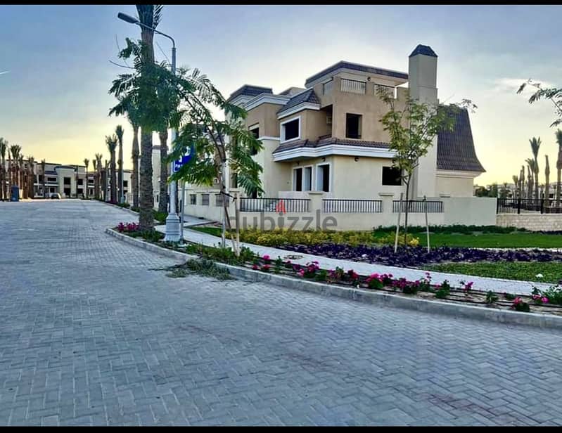 S villa for sale in Sarai Compound, New Cairo, corner 239 m, on the Suez Road directly next to Madinaty and Mountain View, 120% discount installments 17
