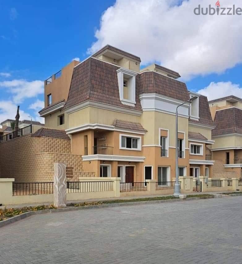 S villa for sale in Sarai Compound, New Cairo, corner 239 m, on the Suez Road directly next to Madinaty and Mountain View, 120% discount installments 20
