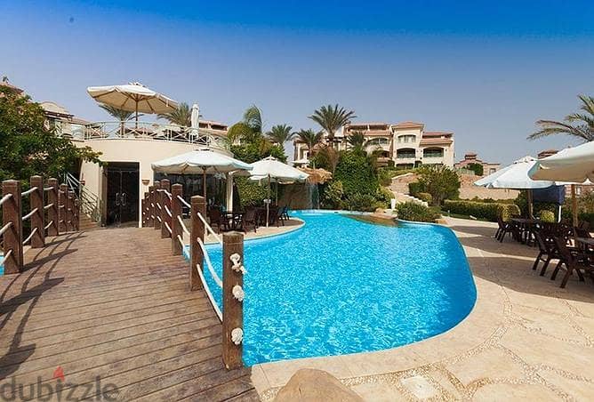 Without down payment and in installments over 7 years, own a 150m ground chalet with a sea, landscape and pools view in La Vista Topaz, Ain Sokhna. 1