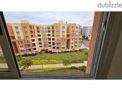 **Apartment for Sale in Madinaty: 107 sqm with Garden and Street View, B8, Opposite Amenities**