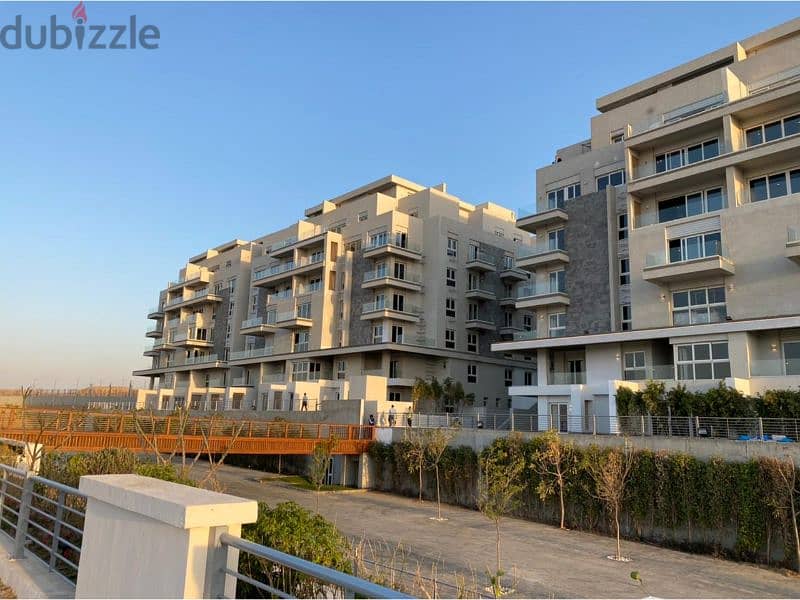 Apartment 170m in Mountain View iCity with the lowest down payment in the market, ready to move , with the strongest view on the club and Central Park 10