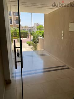 for sale in Fifth square Almarasem Apartment ground floor 220m with garden