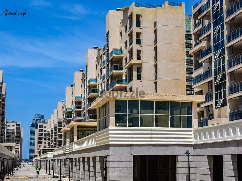 Apartment for sale in Downtown, New Alamein Towers - Ready To Move , fully finished - 5% down payment 1