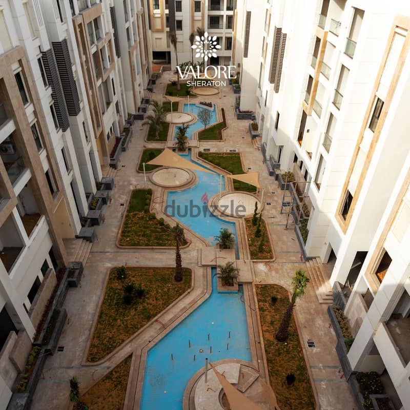 A fully finished luxury apartment with air conditioners and kitchen for sale in installments in Sheraton Heliopolis, a very elegant, full-service 8