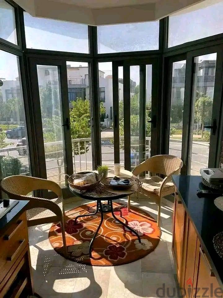 apartment with private garden for sale in Taj City Compound, Fifth Settlement, in a very special location and at the best price in New Cairo. 3